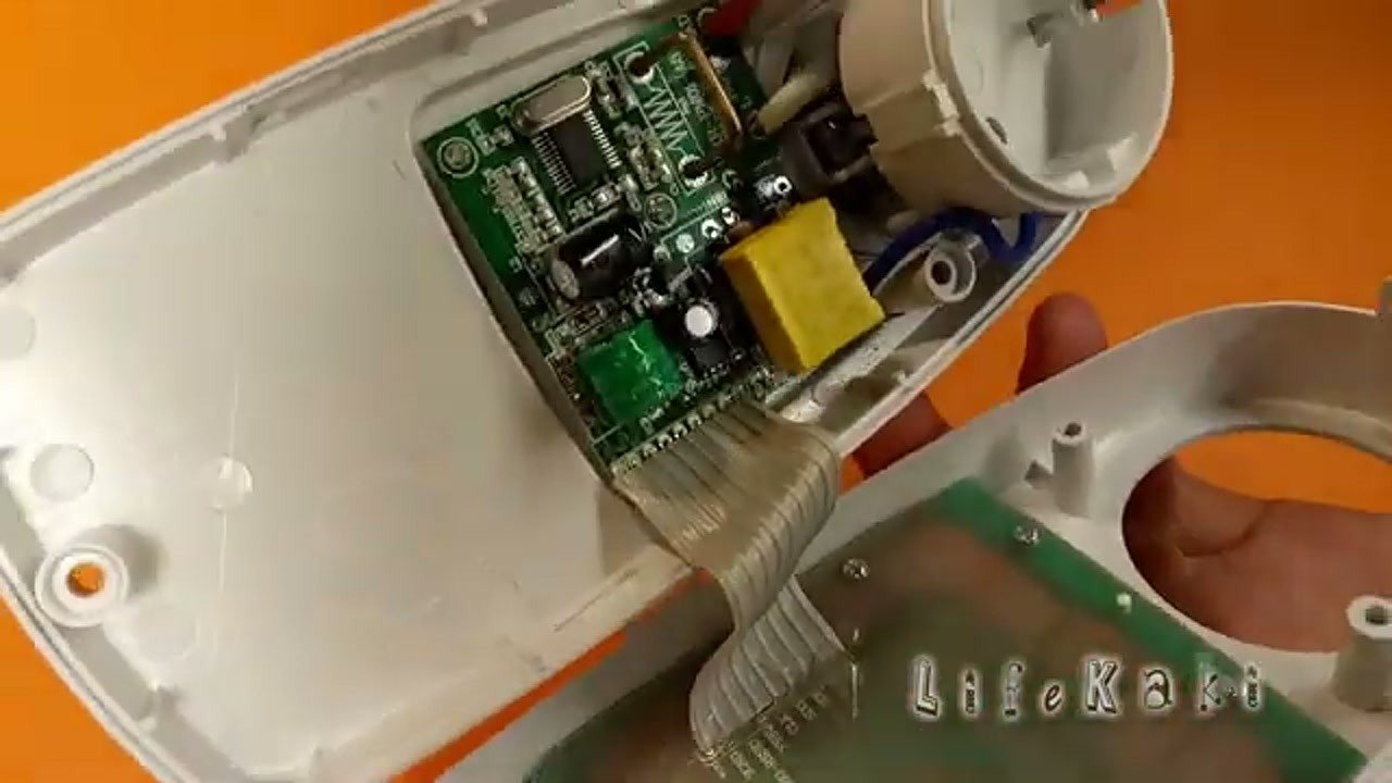 Inspecting the internal circuit board and ribbon cable connections