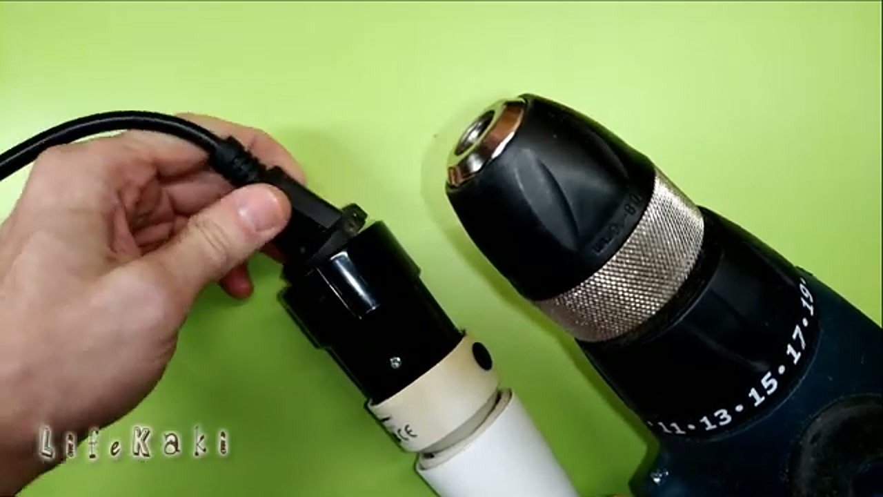 Plugging a power cord into the completed adapter