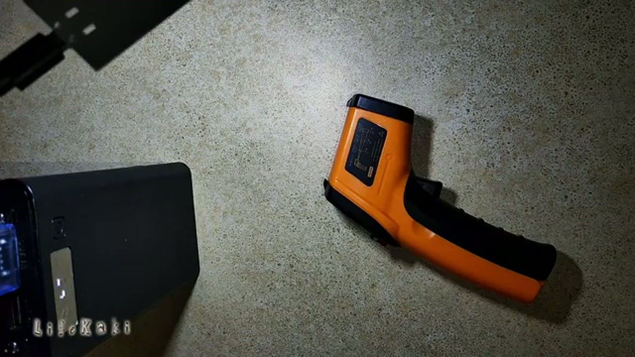 Infrared thermometer on table