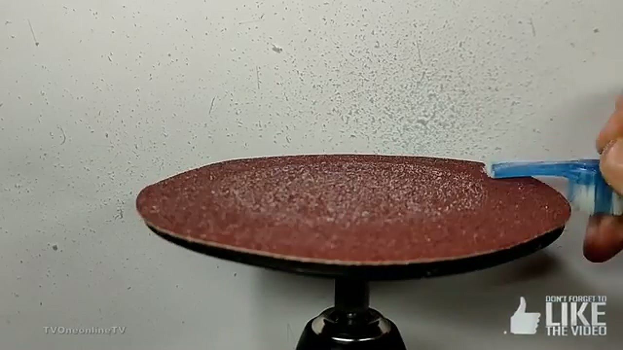 Modified toothbrush head prepared for vacuum attachment