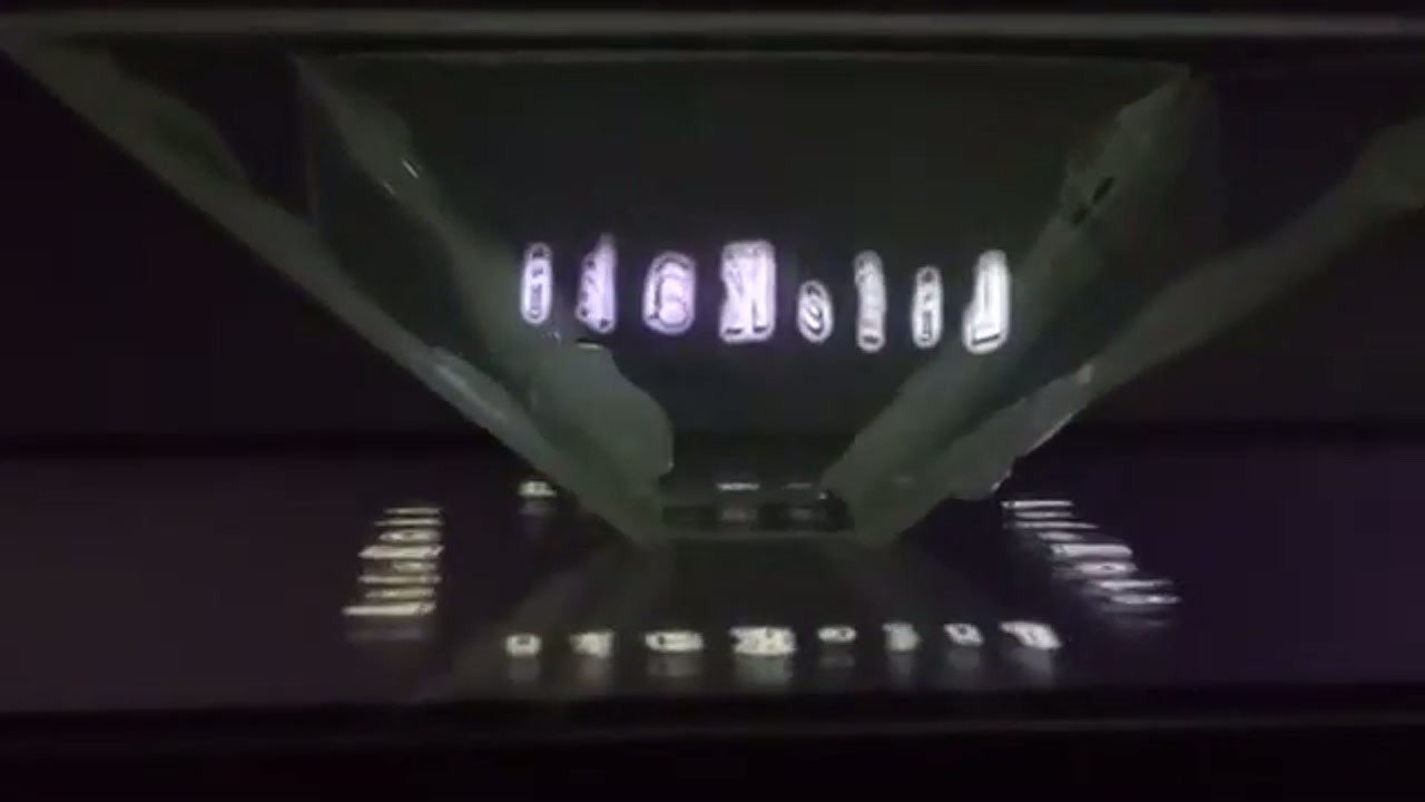 Assembling the hologram pyramid structure with hot glue