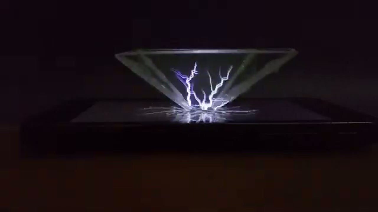 Testing the hologram projector with lightning effects in a dark room