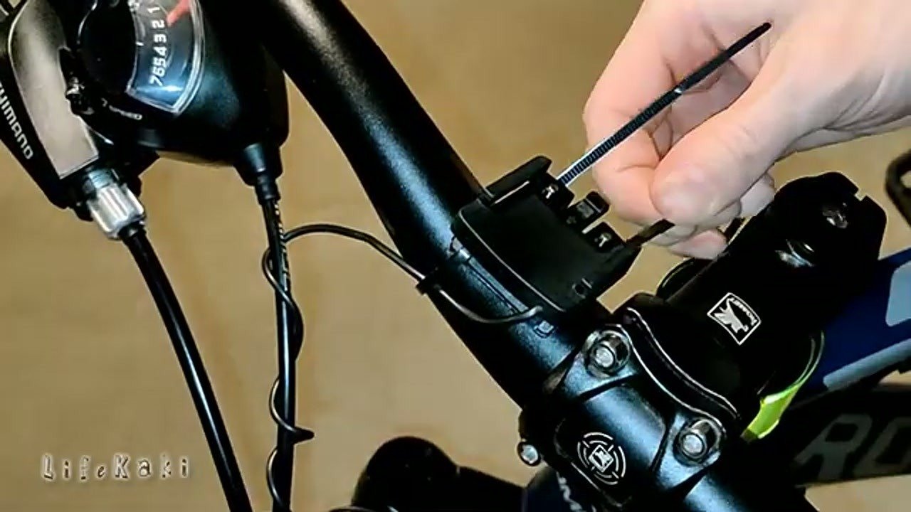 Bike computer mount secured with zip ties