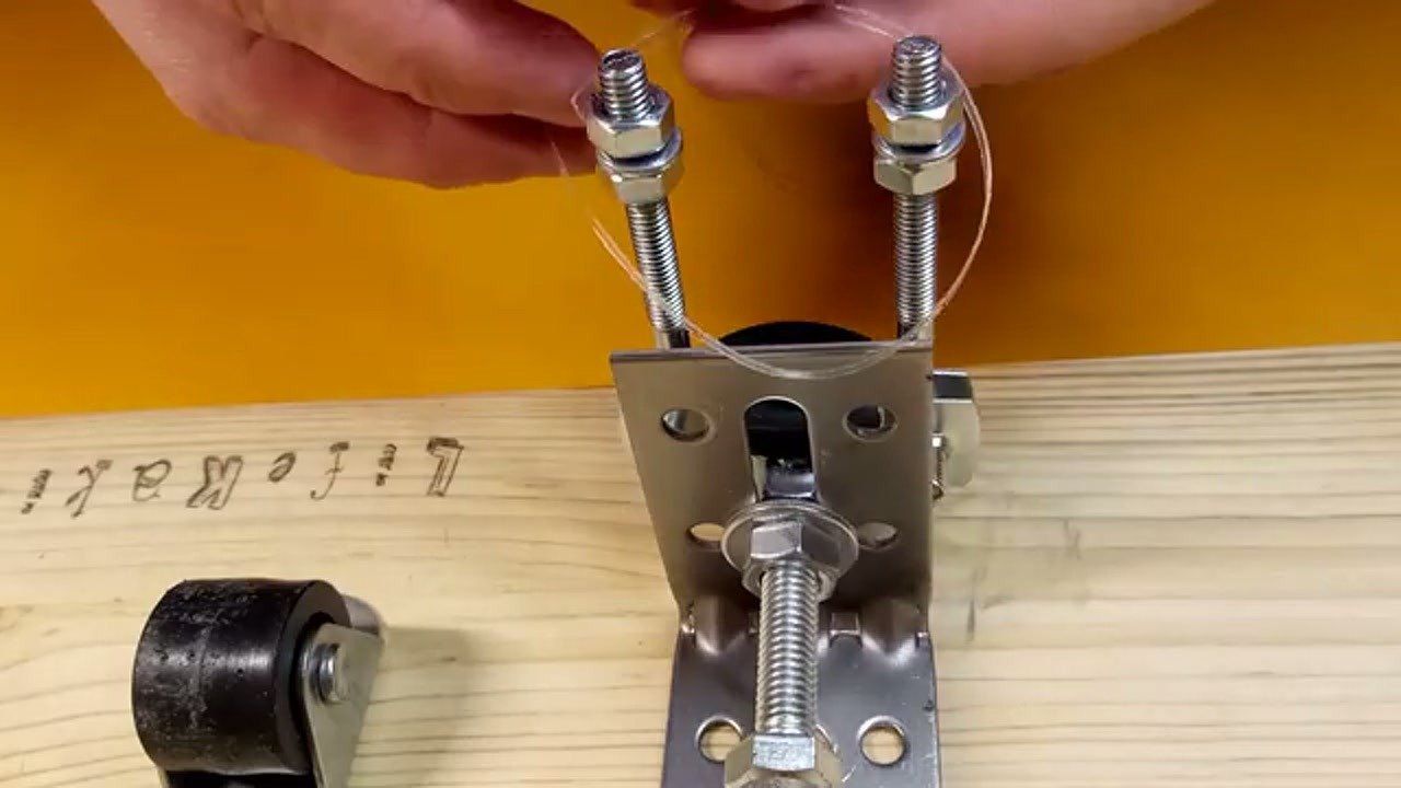 Threading plastic strips through the bolt assembly