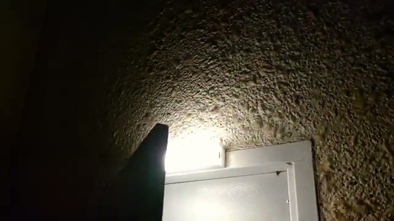 Testing the LED light in a dark closet