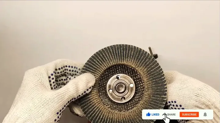 Gripping flap disc perimeter to loosen nut via palm torque