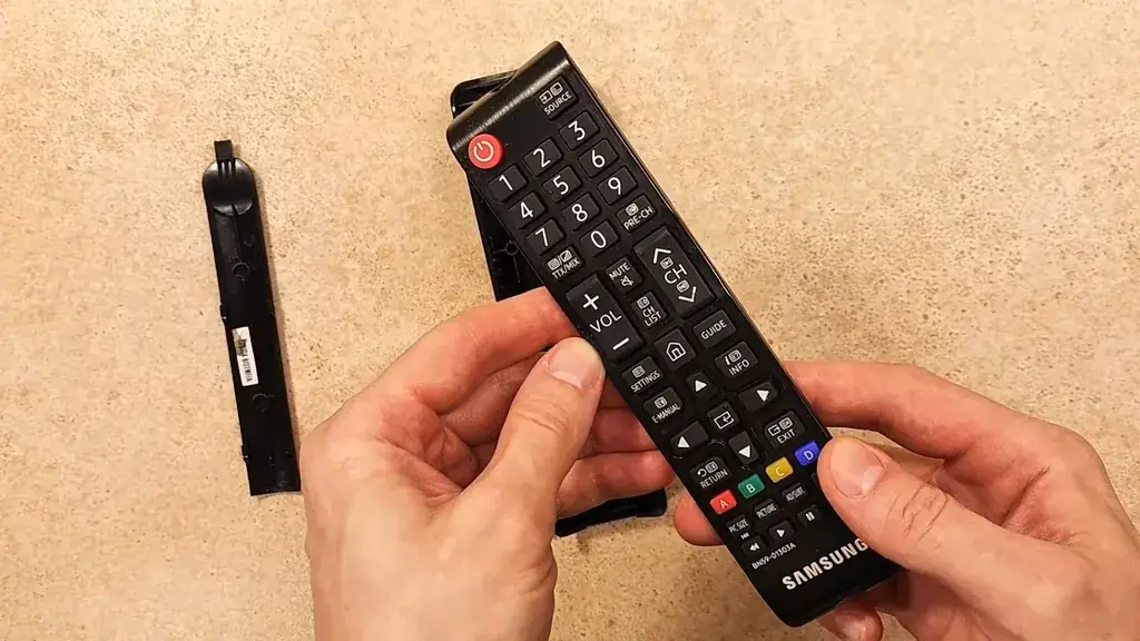 Reinstalling the rubber keypad into the casing