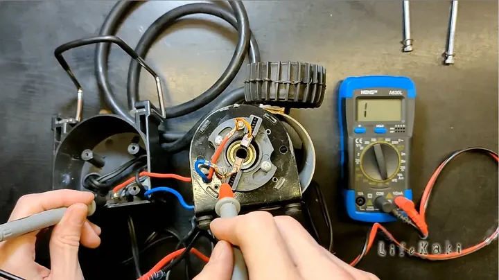 Testing continuity on compressor motor using digital multimeter