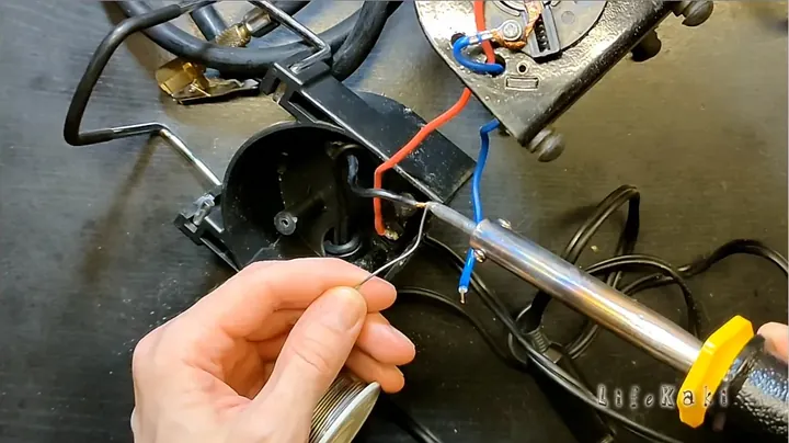 Tinning copper wire ends using electric soldering iron