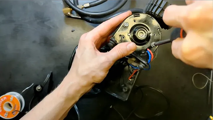 Tightening exterior casing screws on portable air compressor
