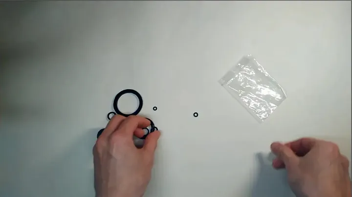 Laying out and inspecting rubber O-rings from sprayer repair kit