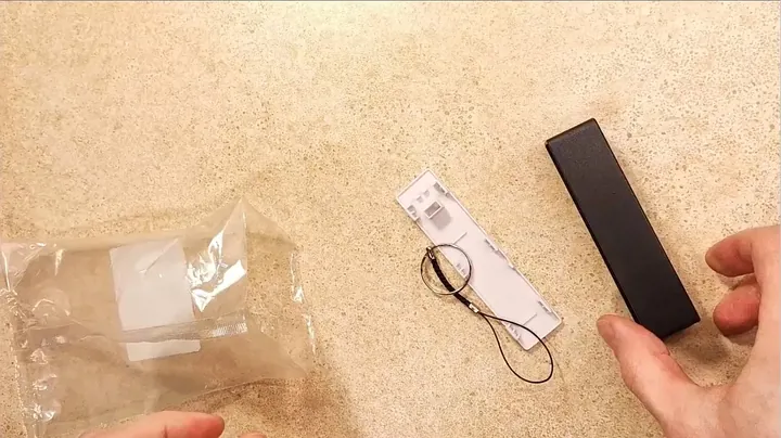 Installing the battery into the plastic holder