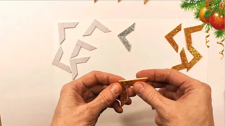 Folding and securing geometric foam pieces with adhesive