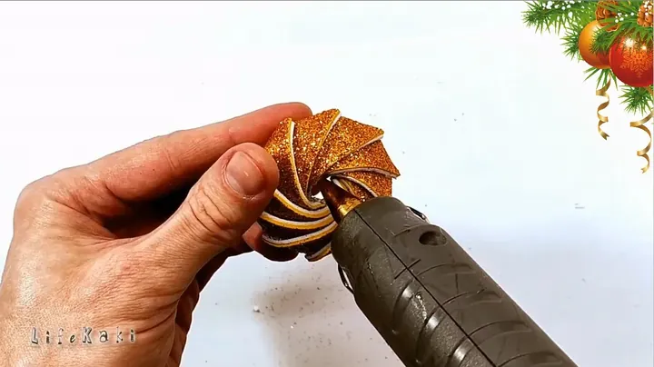 Attaching center decorative bead and hanging cord loop