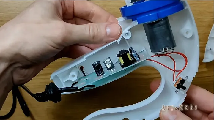 Clear close up showing internal components and wiring during inspection