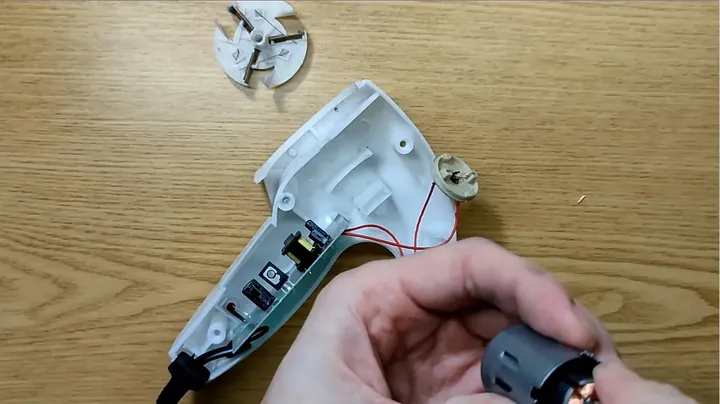 Sharp and clear overhead shot showing motor reassembly process